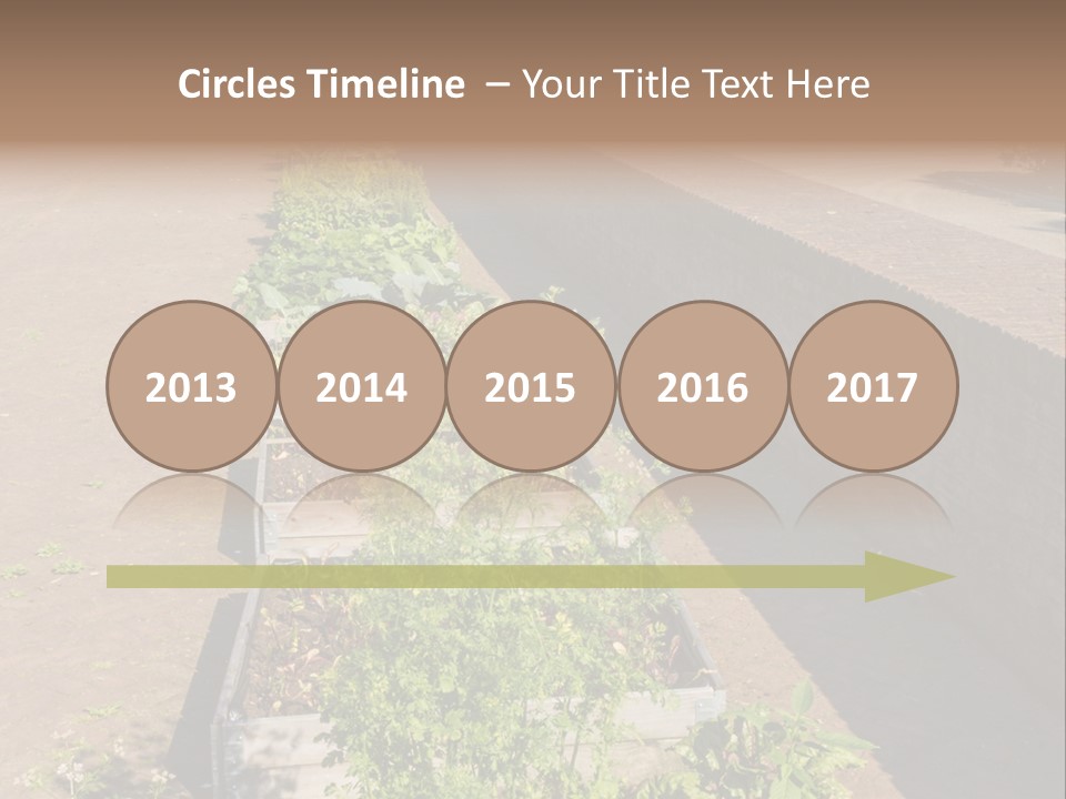 A Row Of Plants In Front Of A Brick Building PowerPoint Template