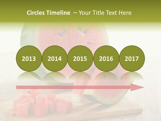 A Piece Of Watermelon Sitting On Top Of A Cutting Board PowerPoint Template