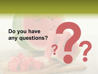 A Piece Of Watermelon Sitting On Top Of A Cutting Board PowerPoint Template