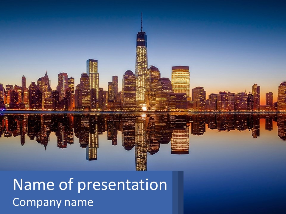 A City Skyline Is Shown At Night With A Reflection In The Water PowerPoint Template