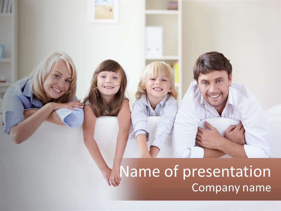 A Family Sitting On A Couch In A Living Room PowerPoint Template