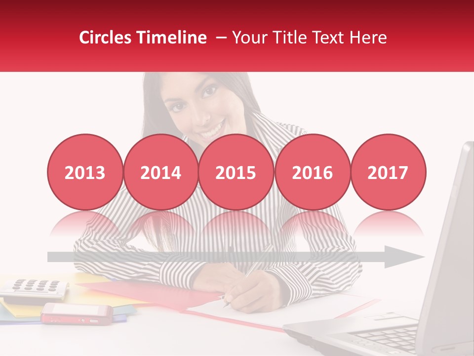 A Woman Sitting At A Desk With A Laptop PowerPoint Template