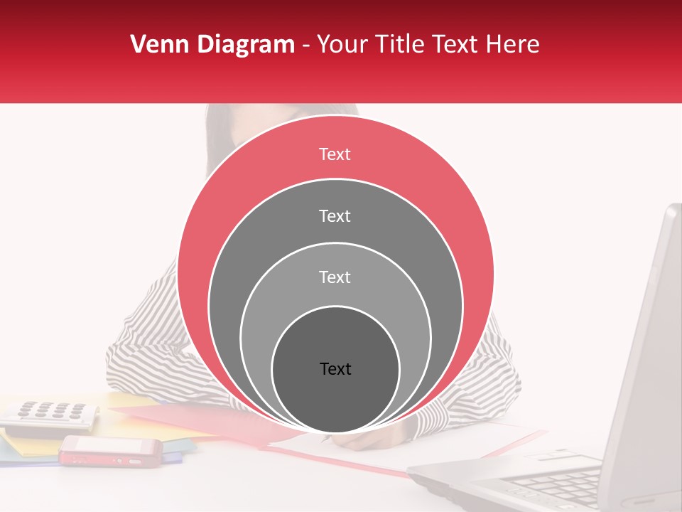 A Woman Sitting At A Desk With A Laptop PowerPoint Template