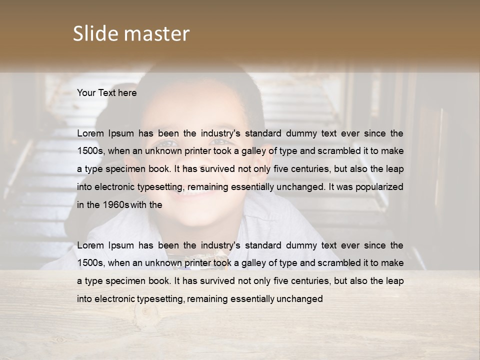 A Young Boy Is Smiling For The Camera PowerPoint Template