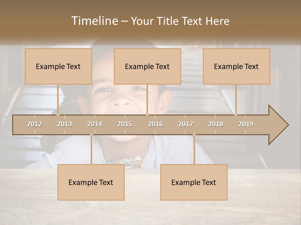 A Young Boy Is Smiling For The Camera PowerPoint Template