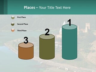 A Large Castle Sitting On Top Of A Lush Green Hillside PowerPoint Template