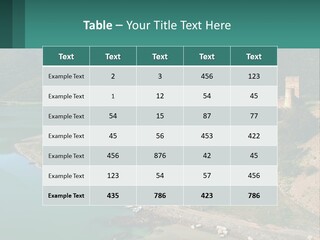 A Large Castle Sitting On Top Of A Lush Green Hillside PowerPoint Template