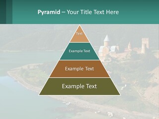 A Large Castle Sitting On Top Of A Lush Green Hillside PowerPoint Template