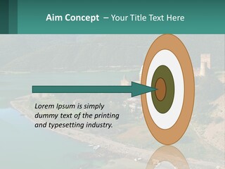 A Large Castle Sitting On Top Of A Lush Green Hillside PowerPoint Template