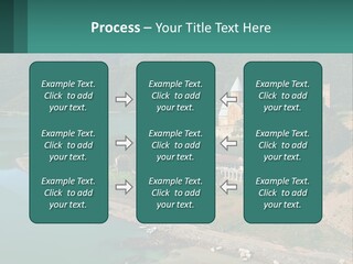 A Large Castle Sitting On Top Of A Lush Green Hillside PowerPoint Template