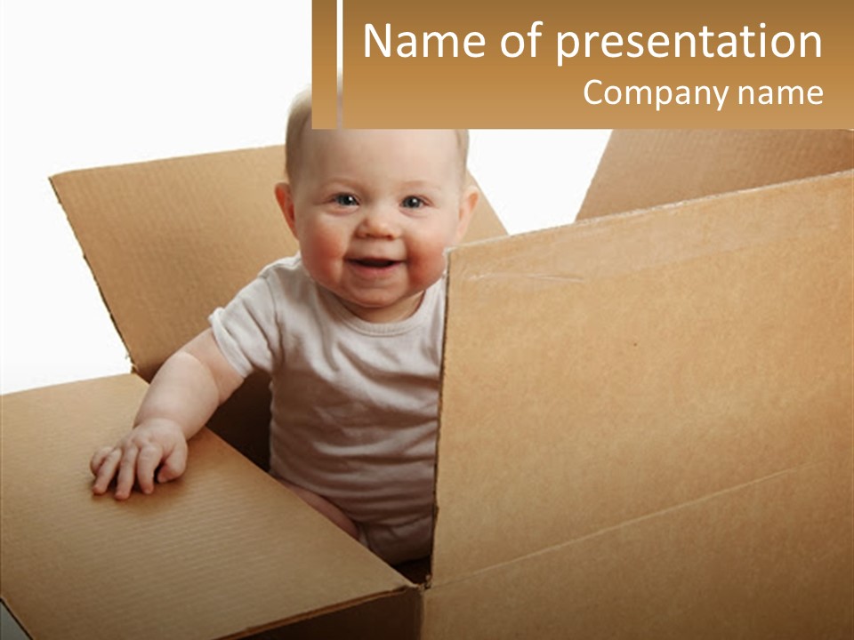 A Baby Sitting In A Cardboard Box With A Smile On His Face PowerPoint Template