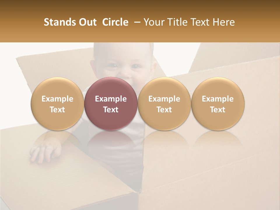 A Baby Sitting In A Cardboard Box With A Smile On His Face PowerPoint Template