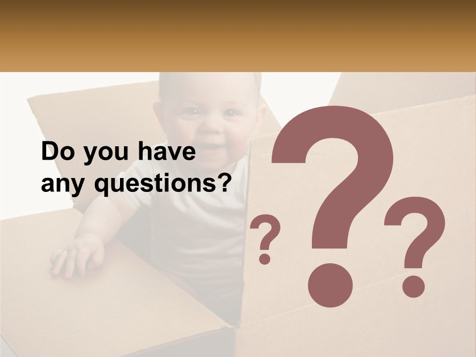 A Baby Sitting In A Cardboard Box With A Smile On His Face PowerPoint Template