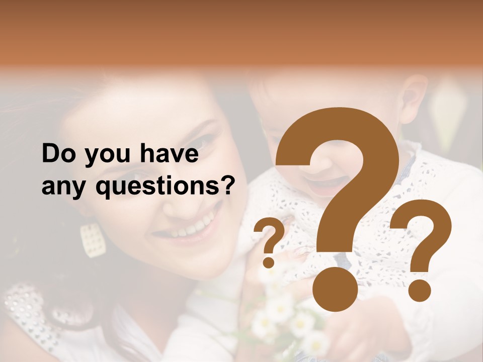 A Woman Holding A Small Child In Her Arms PowerPoint Template