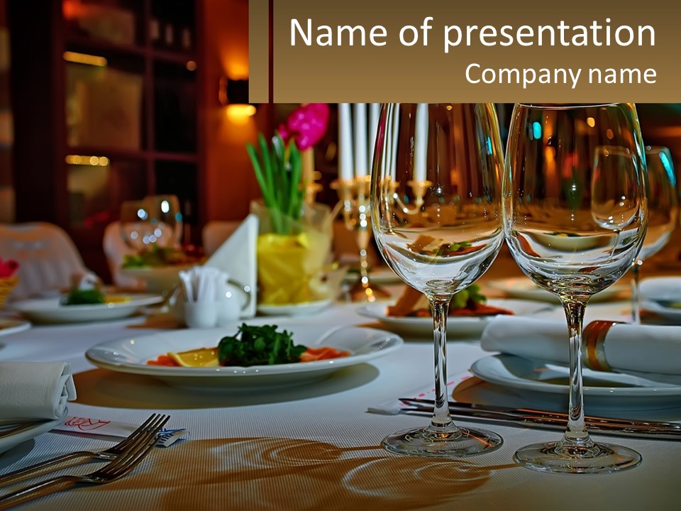 A Table Set For A Formal Dinner With Wine Glasses PowerPoint Template