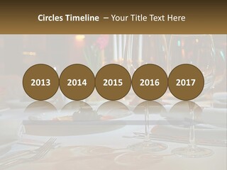 A Table Set For A Formal Dinner With Wine Glasses PowerPoint Template