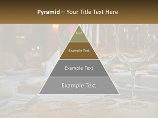 A Table Set For A Formal Dinner With Wine Glasses PowerPoint Template