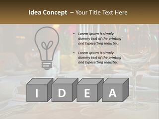 A Table Set For A Formal Dinner With Wine Glasses PowerPoint Template