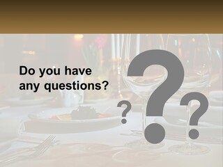 A Table Set For A Formal Dinner With Wine Glasses PowerPoint Template