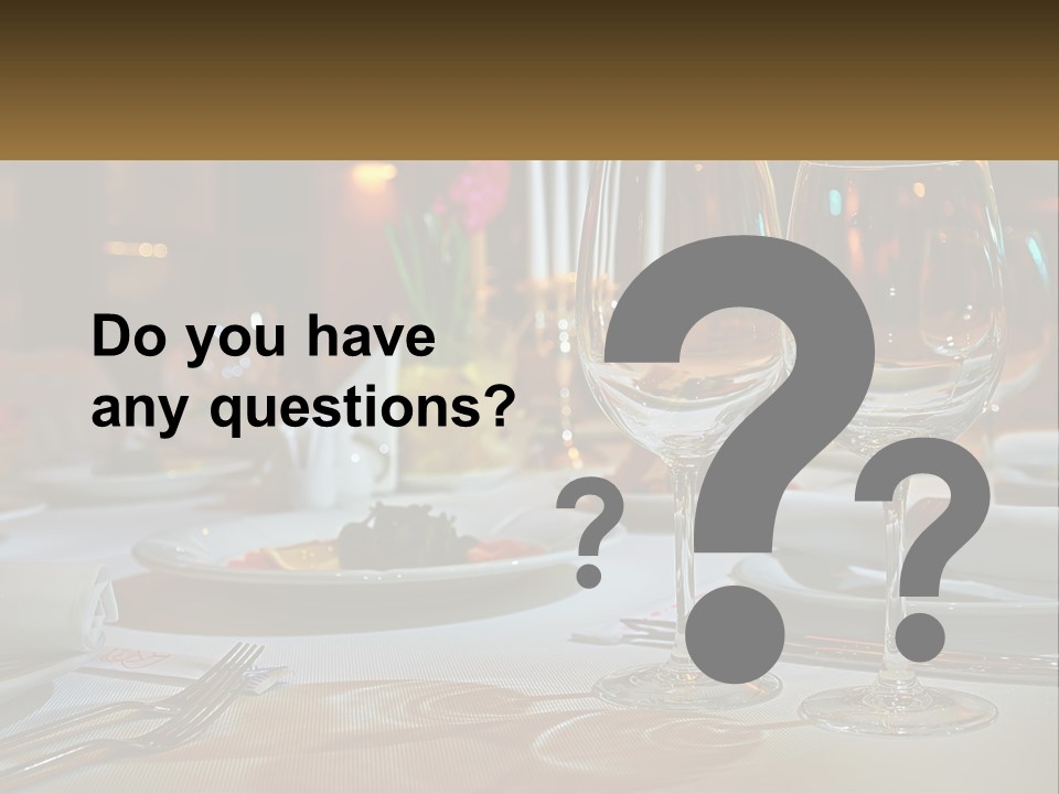 A Table Set For A Formal Dinner With Wine Glasses PowerPoint Template