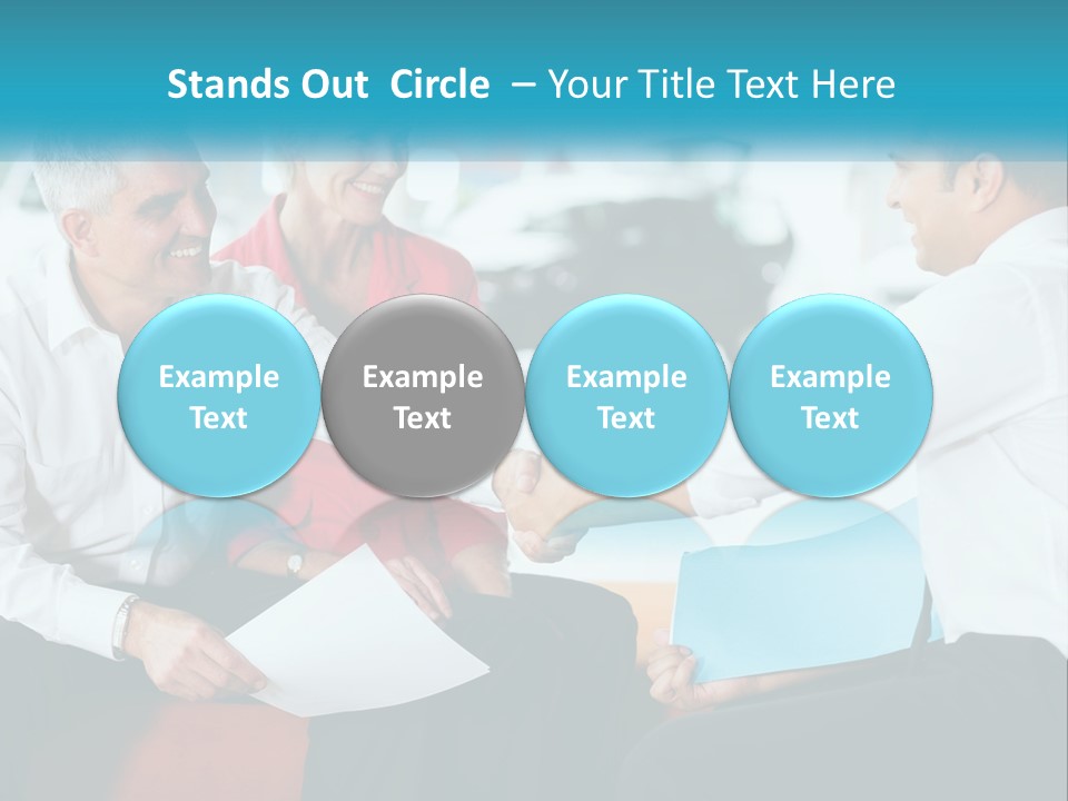 A Couple Of People Shaking Hands Over A Piece Of Paper PowerPoint Template