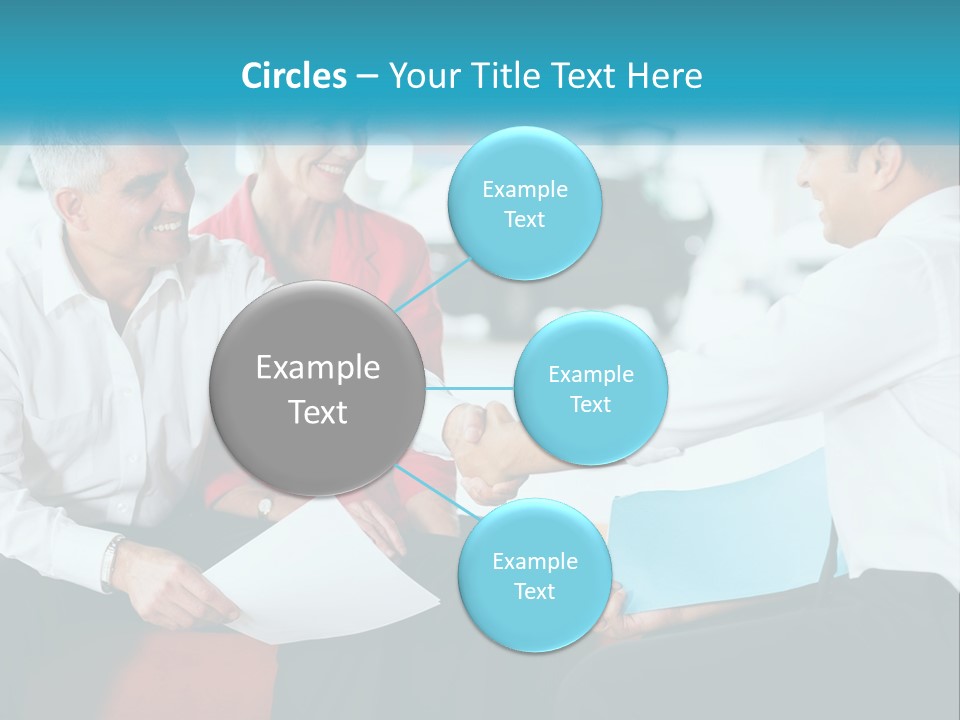 A Couple Of People Shaking Hands Over A Piece Of Paper PowerPoint Template