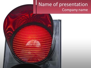 A Red Traffic Light With A White Background PowerPoint Template