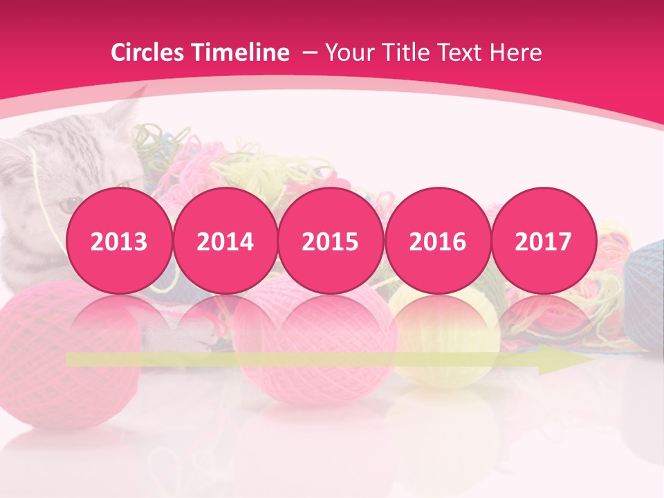 A Cat Laying On Top Of A Pile Of Balls Of Yarn PowerPoint Template