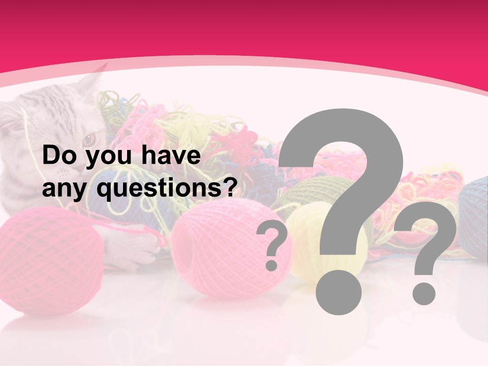 A Cat Laying On Top Of A Pile Of Balls Of Yarn PowerPoint Template