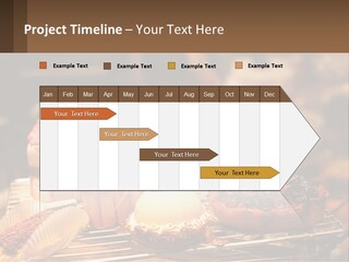 A Table Topped With Cakes And Pastries Covered In Icing PowerPoint Template
