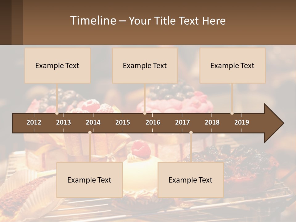 A Table Topped With Cakes And Pastries Covered In Icing PowerPoint Template