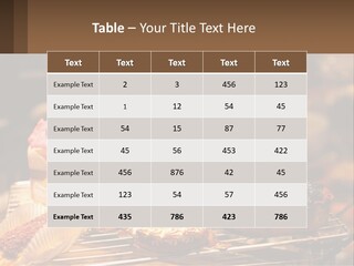A Table Topped With Cakes And Pastries Covered In Icing PowerPoint Template