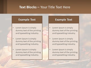 A Table Topped With Cakes And Pastries Covered In Icing PowerPoint Template