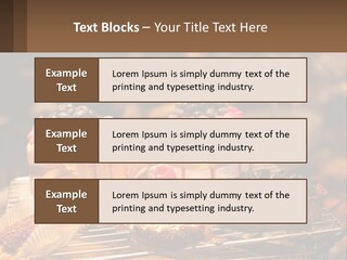A Table Topped With Cakes And Pastries Covered In Icing PowerPoint Template
