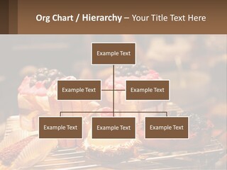 A Table Topped With Cakes And Pastries Covered In Icing PowerPoint Template