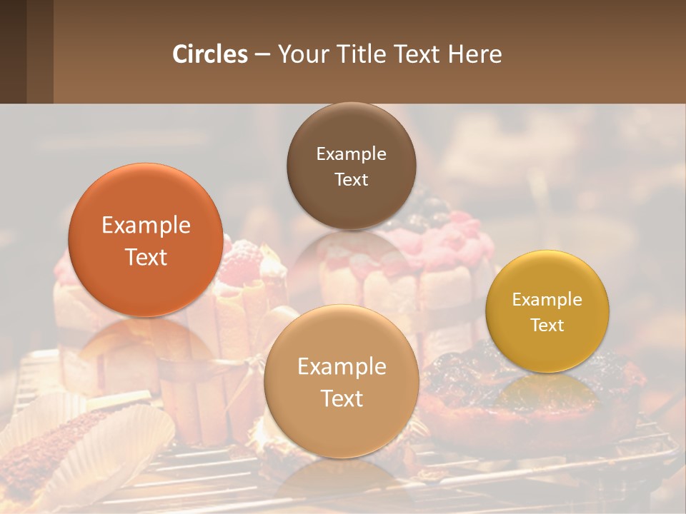 A Table Topped With Cakes And Pastries Covered In Icing PowerPoint Template
