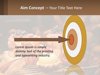 A Table Topped With Cakes And Pastries Covered In Icing PowerPoint Template
