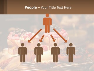 A Table Topped With Cakes And Pastries Covered In Icing PowerPoint Template