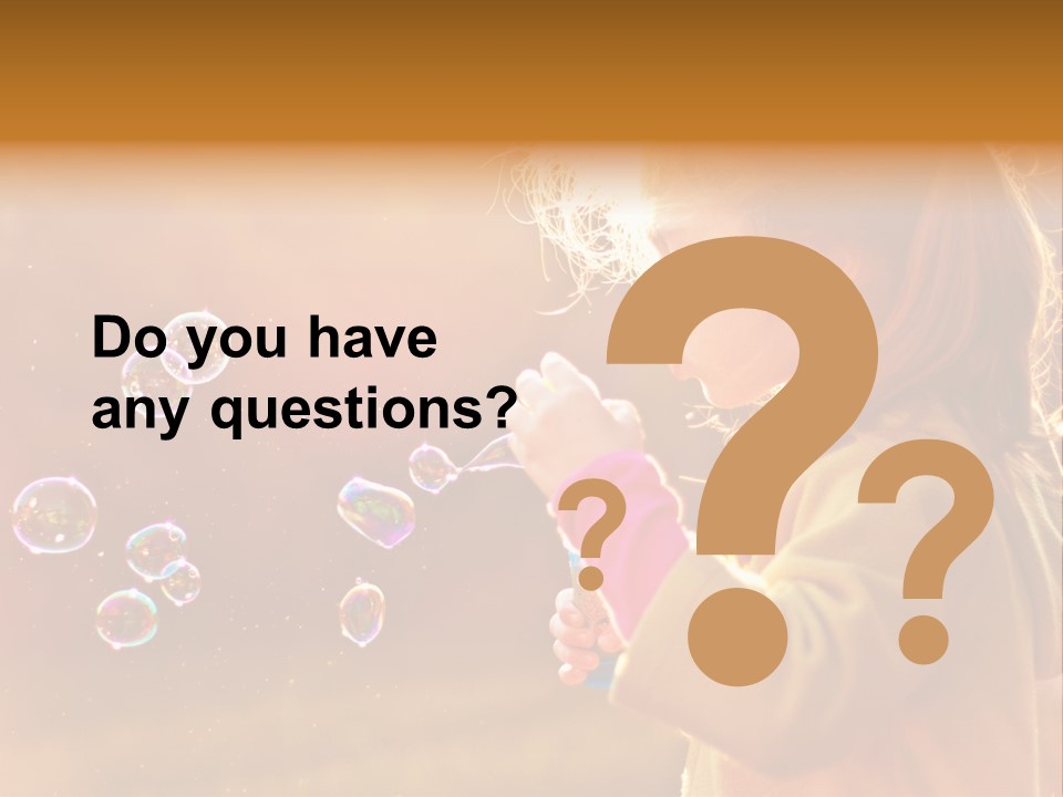 A Little Girl Blowing Bubbles In The Air PowerPoint Template