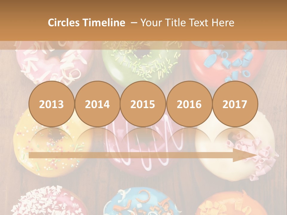 A Group Of Donuts Sitting On Top Of A Wooden Table PowerPoint Template