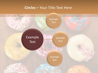 A Group Of Donuts Sitting On Top Of A Wooden Table PowerPoint Template