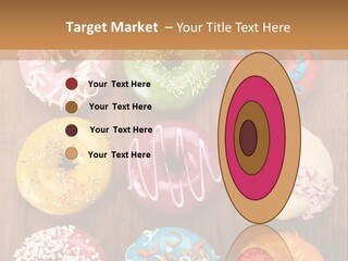 A Group Of Donuts Sitting On Top Of A Wooden Table PowerPoint Template
