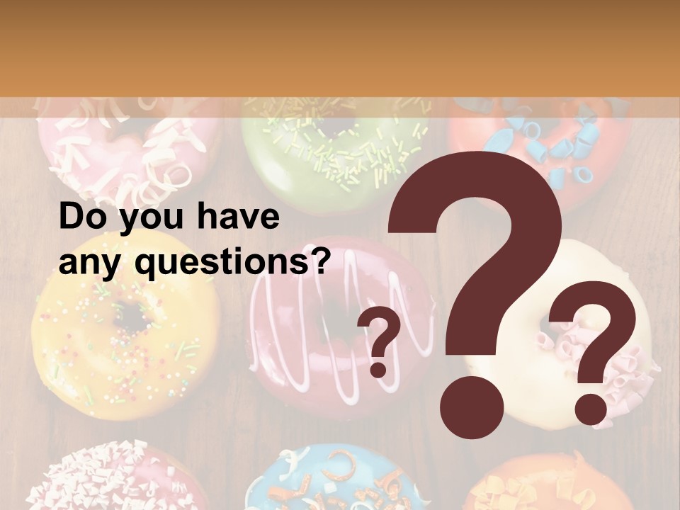 A Group Of Donuts Sitting On Top Of A Wooden Table PowerPoint Template