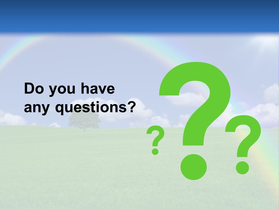 A Green Field With A Rainbow In The Sky PowerPoint Template