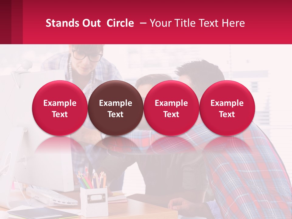 A Group Of People Looking At A Computer Screen PowerPoint Template