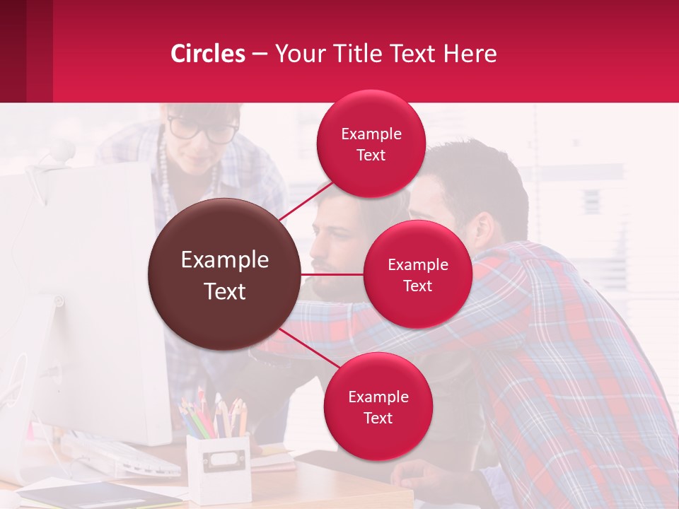 A Group Of People Looking At A Computer Screen PowerPoint Template