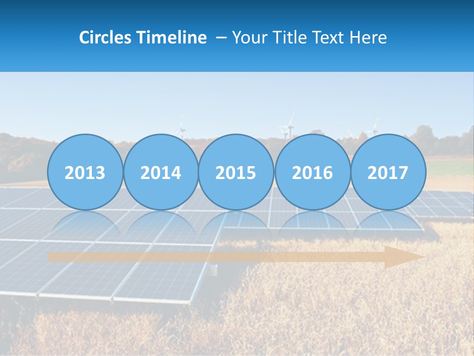 A Group Of Solar Panels In A Field PowerPoint Template