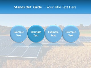 A Group Of Solar Panels In A Field PowerPoint Template
