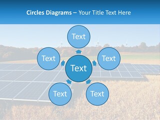 A Group Of Solar Panels In A Field PowerPoint Template