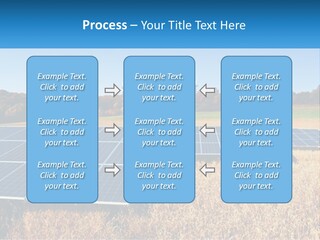 A Group Of Solar Panels In A Field PowerPoint Template